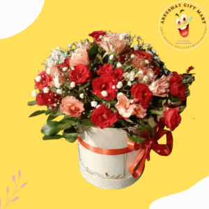 ROUND BOX FILLED WITH BEAUTIFUL FLOWERS